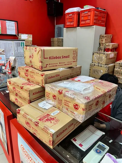 Peanut PC parcels stacked at the LBC counter